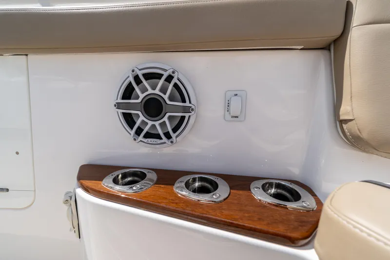 Golden Hour Yacht Photos Pics Speaker and cup holders on 2021 Everglades 395 Center Console boat interior.