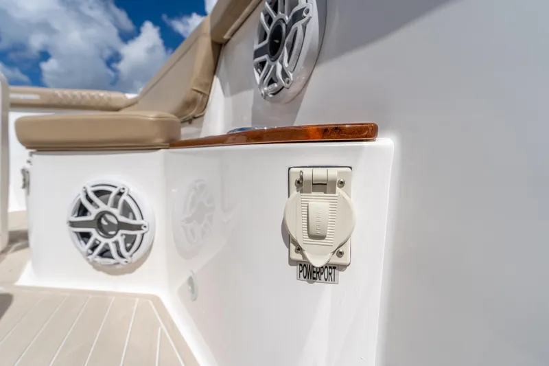 Golden Hour Yacht Photos Pics 2021 Everglades 395 Center Console boat with speakers and power port on deck.