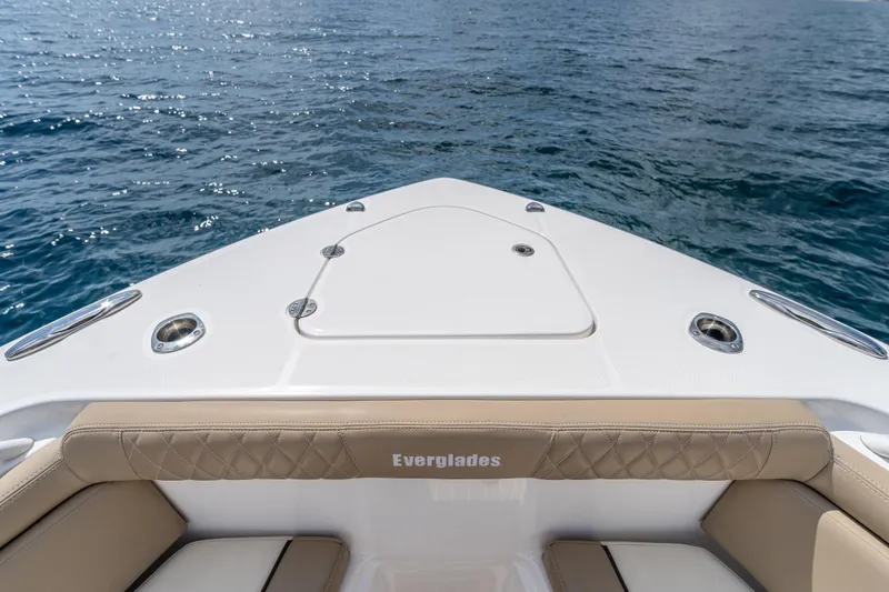 Golden Hour Yacht Photos Pics Bow view of 2021 Everglades 395 Center Console on open water.