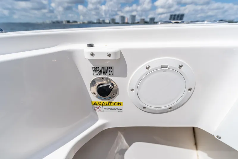 Golden Hour Yacht Photos Pics Fresh water access on 2021 Everglades 395 Center Console boat, caution for non-potable water.