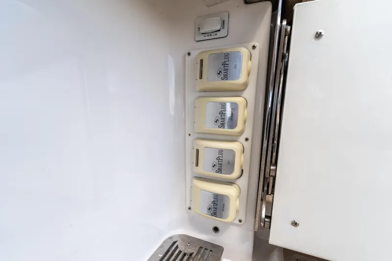 Golden Hour Yacht Photos Pics SmartPlug outlets on 2021 Everglades 395 Center Console boat interior.