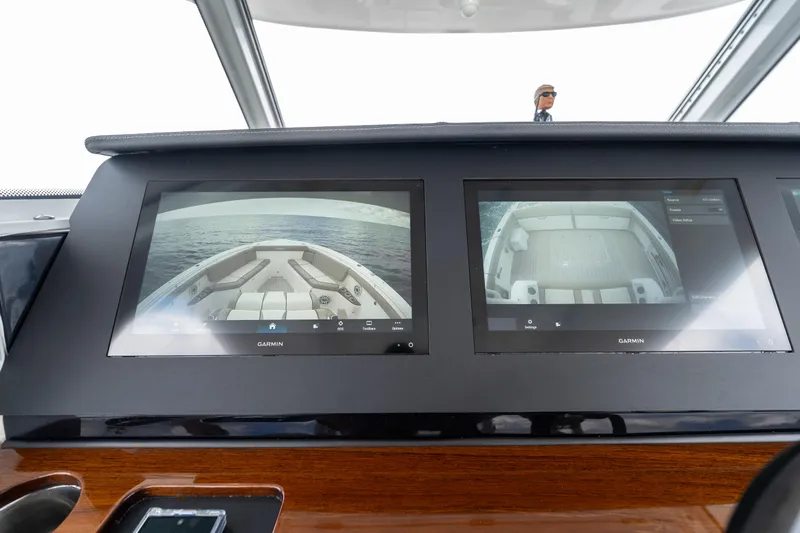 Golden Hour Yacht Photos Pics Dashboard of 2021 Everglades 395 Center Console with dual Garmin displays.