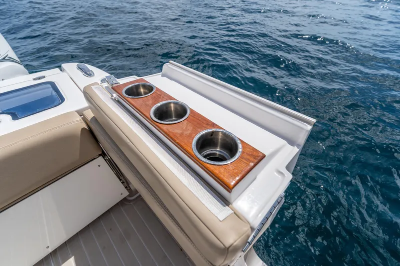 Golden Hour Yacht Photos Pics Luxury seating and cup holders on 2021 Everglades 395 Center Console boat.