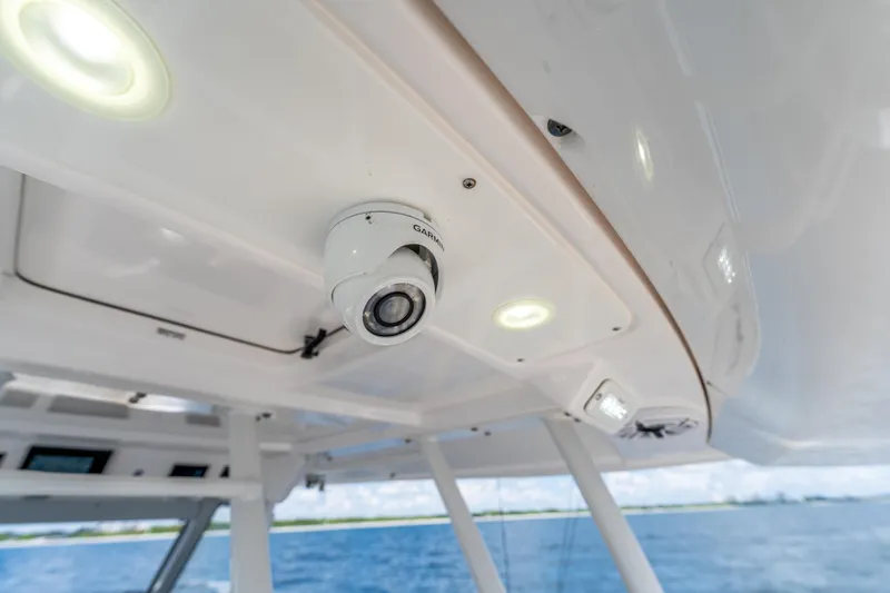 Golden Hour Yacht Photos Pics 2021 Everglades 395 Center Console boat with mounted camera and LED lights.