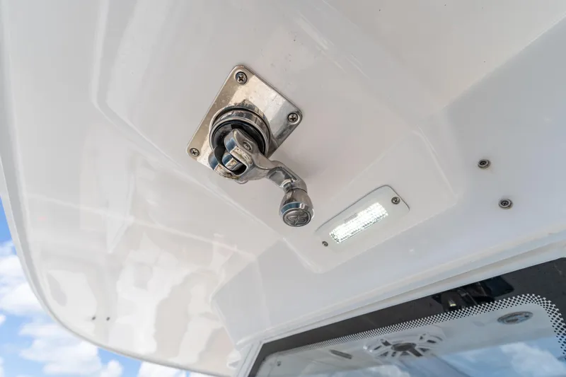 Golden Hour Yacht Photos Pics Close-up of Everglades 395 Center Console 2021 boat hardware and light fixture.