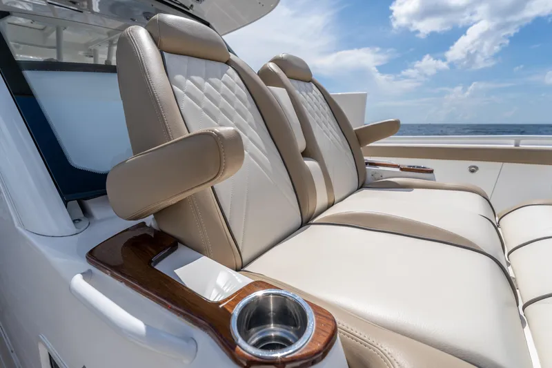 Golden Hour Yacht Photos Pics Luxurious seating on 2021 Everglades 395 Center Console boat with ocean view.