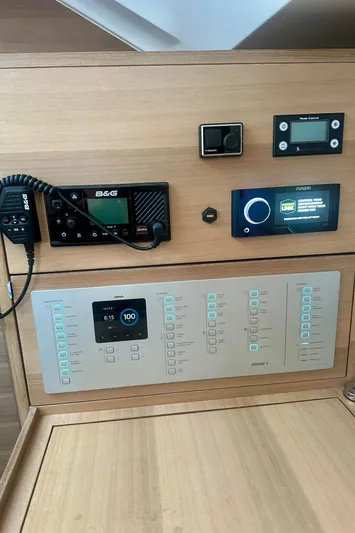 Mystic Impression Yacht Photos Pics Control panel of 2022 Elan Impression 50.1 yacht with navigation and communication systems.