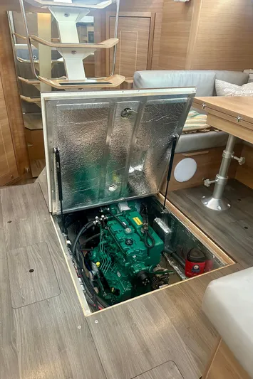 Mystic Impression Yacht Photos Pics Engine compartment of 2022 Elan Impression 50.1 yacht, featuring a green engine.