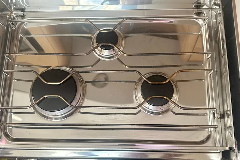 Mystic Impression Yacht Photos Pics Stainless steel stove with three burners on Elan Impression 50.1 yacht, 2022 model.