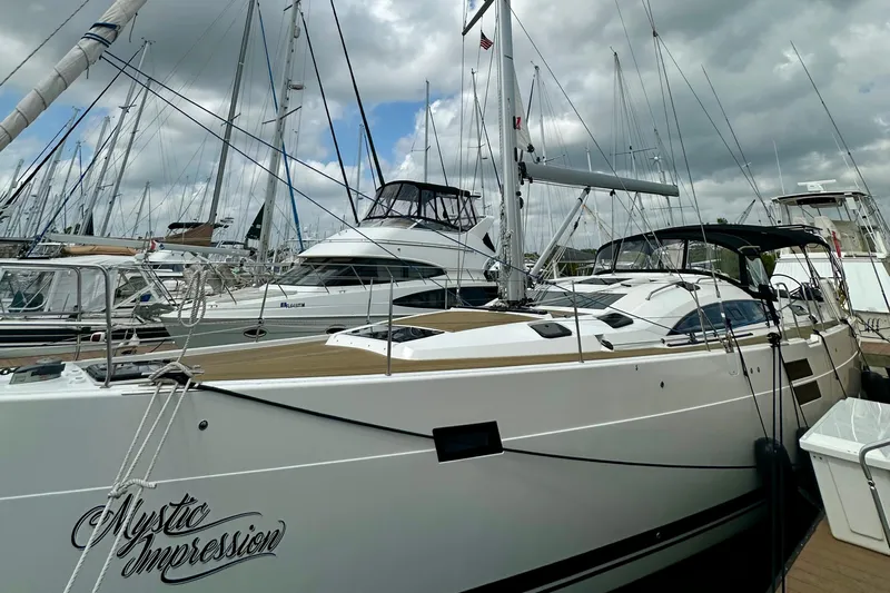 Mystic Impression Yacht Photos Pics 2022 Elan Impression 50.1 yacht docked, featuring sleek design and modern amenities.
