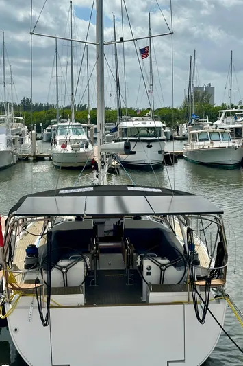 Mystic Impression Yacht Photos Pics 2022 Elan Impression 50.1 yacht docked at a marina with other boats.