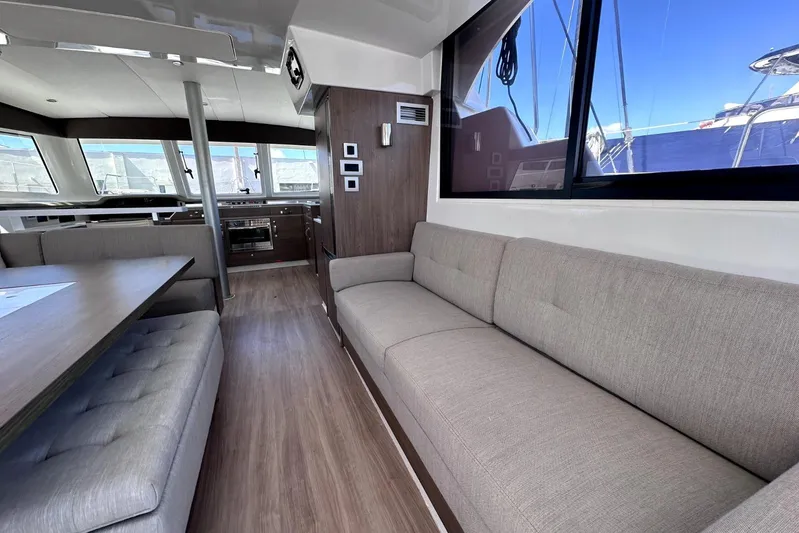 Wiley Pixie Yacht Photos Pics Modern interior of 2023 Bali CATSPACE catamaran with spacious seating and large windows.