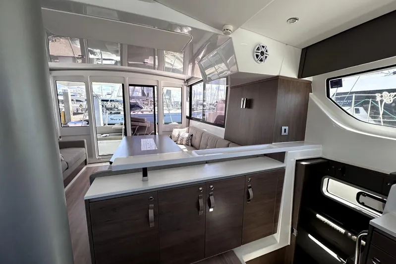 Wiley Pixie Yacht Photos Pics Modern interior of 2023 Bali CATSPACE catamaran with sleek design and spacious seating area.
