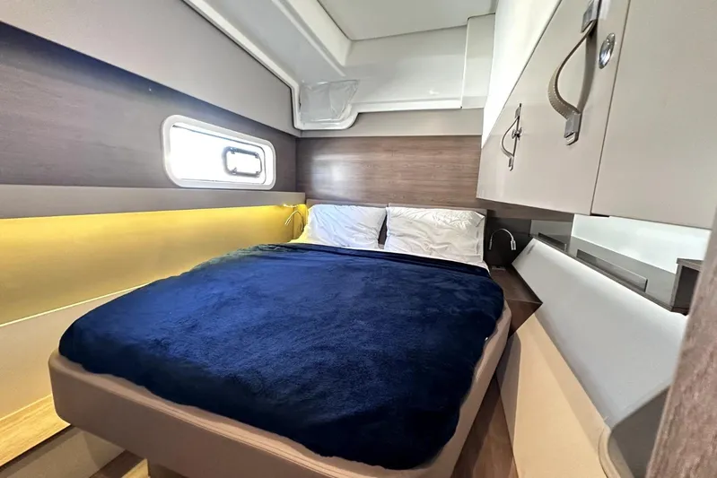 Wiley Pixie Yacht Photos Pics Luxurious cabin interior of 2023 Bali CATSPACE yacht with cozy bed and modern design.