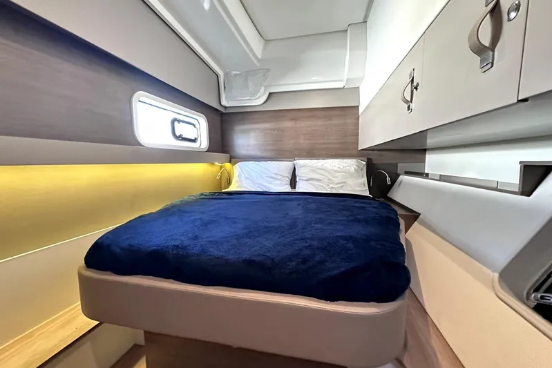 Wiley Pixie Yacht Photos Pics Luxurious cabin interior of 2023 Bali CATSPACE yacht with cozy bed and modern design.