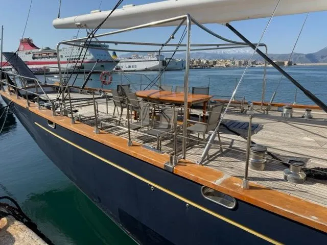 42 M Custom Made Motorsailor Yacht Photos Pics Custom Made 42 M Motorsailor, 2006, docked with outdoor seating on deck.