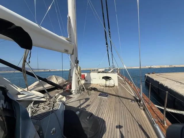 42 M Custom Made Motorsailor Yacht Photos Pics Custom Made 42 M Motorsailor, 2006, docked with clear blue sky and calm waters.