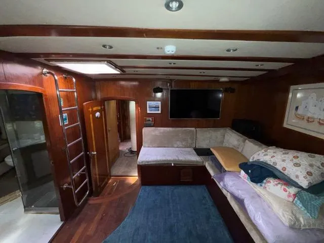 42 M Custom Made Motorsailor Yacht Photos Pics Luxurious interior of 2006 Custom Made 42 M Motorsailor with cozy seating and modern amenities.