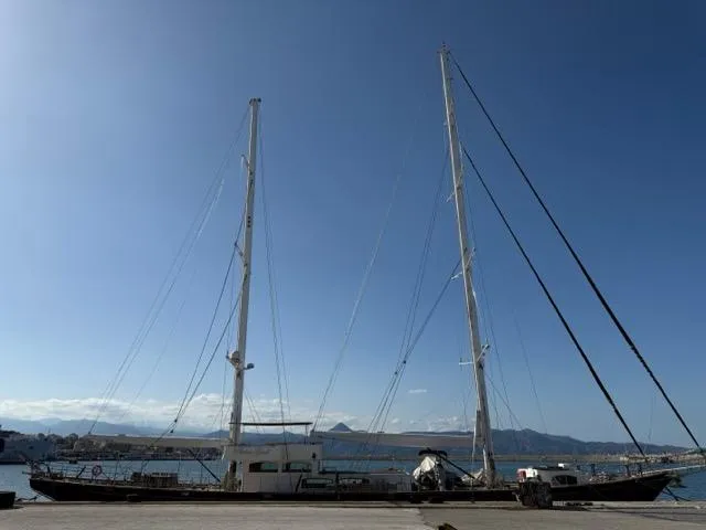 42 M Custom Made Motorsailor Yacht Photos Pics Custom Made 42 M Motorsailor, 2006, docked with clear sky and mountains in background.