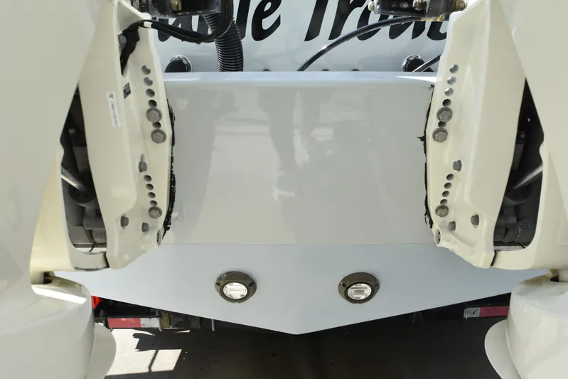 Double Trouble Yacht Photos Pics Rear view of a 2007 Custom Carolina 28 Cape Lookout boat, showcasing repowered engines.