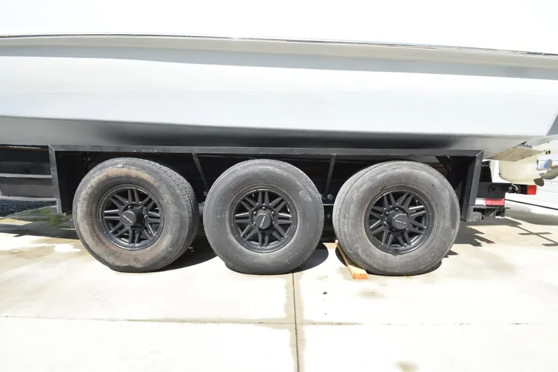 Double Trouble Yacht Photos Pics Triple-axle trailer for 2007 Custom Carolina 28 Cape Lookout boat, 2019 repower.