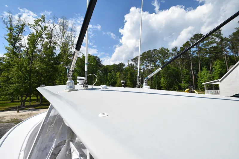 Double Trouble Yacht Photos Pics Custom Carolina 28 Cape Lookout boat, 2007 model, repowered in 2019, docked outdoors.