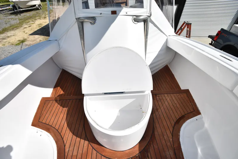 Double Trouble Yacht Photos Pics Custom Carolina 28 Cape Lookout boat deck with wooden flooring, 2007 model, repowered in 2019.