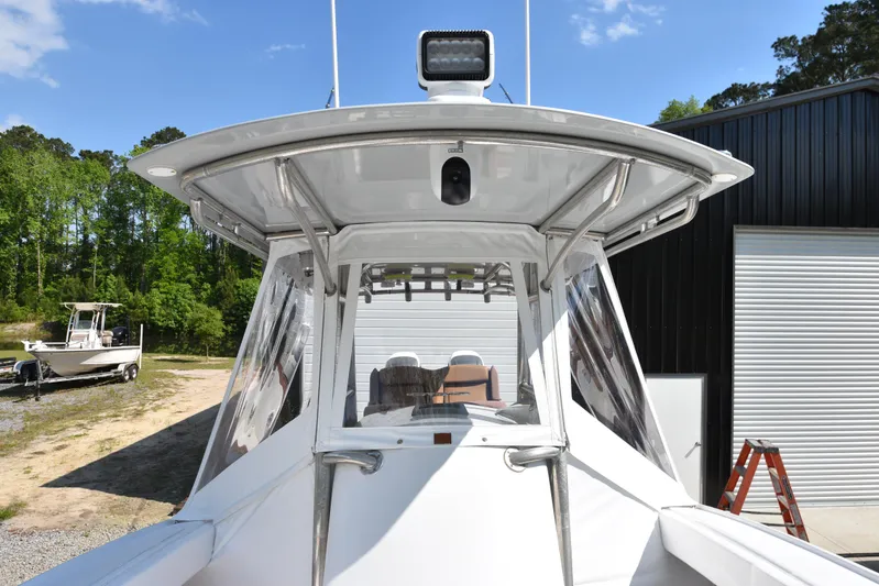 Double Trouble Yacht Photos Pics Custom Carolina 28 Cape Lookout boat, 2007 model, repowered in 2019, docked outdoors.