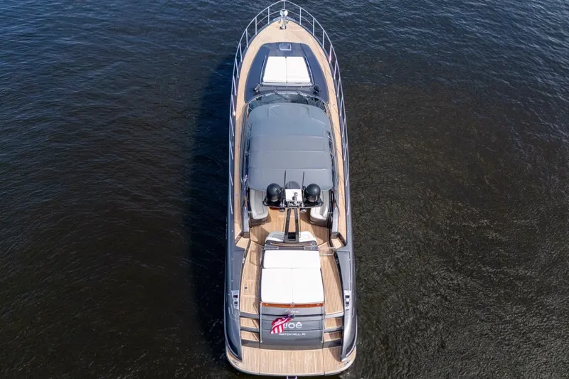  Yacht Photos Pics Aerial view of 2015 Riva 63 yacht on calm water.