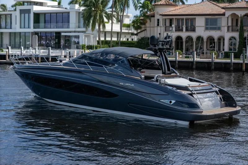  Yacht Photos Pics Luxury 2015 Riva 63 yacht docked near waterfront homes.