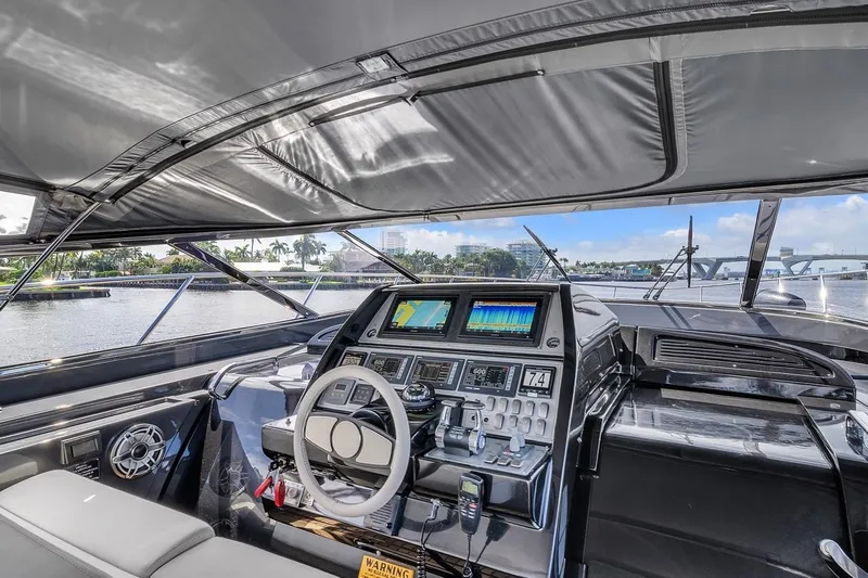  Yacht Photos Pics Interior view of 2015 Riva 63 yacht cockpit with advanced navigation system.