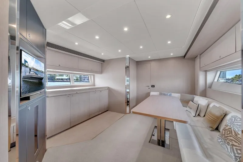  Yacht Photos Pics Luxurious interior of a 2015 Riva 63 yacht with modern seating and elegant decor.