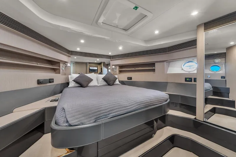  Yacht Photos Pics Luxurious interior of 2015 Riva 63 yacht with modern bedroom design.