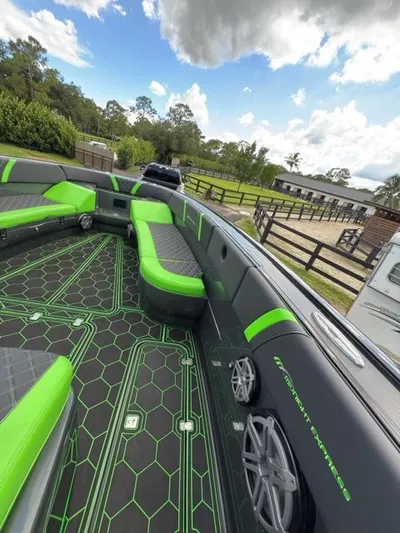  Yacht Photos Pics 2020 Midnight Express Open 43 boat with green and black interior, parked outdoors.