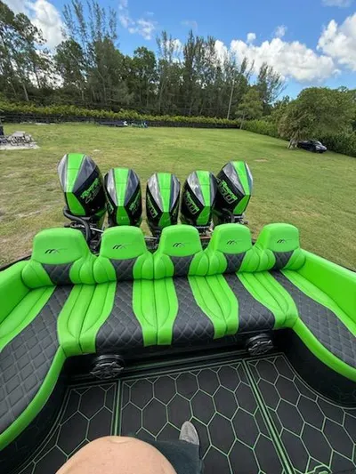  Yacht Photos Pics 2020 Midnight Express Open 43 boat with vibrant green seating and multiple engines.