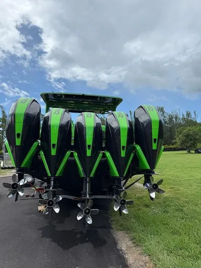  Yacht Photos Pics Five green and black outboard motors on a 2020 Midnight Express Open 43 boat.