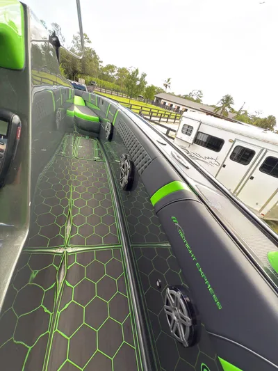  Yacht Photos Pics 2020 Midnight Express Open 43 boat with sleek green and black interior design.