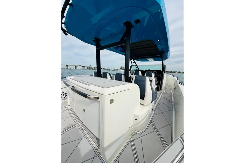 Out Of The Blue Yacht Photos Pics 2021 Axopar 37 Sun Top boat with sleek design and spacious seating on the water.