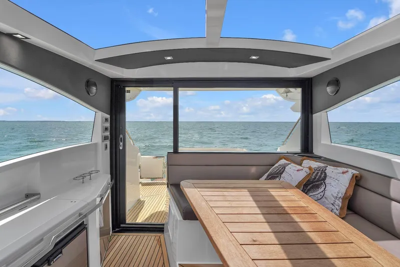  Yacht Photos Pics Interior of 2017 Galeon 445 HTS yacht with ocean view and modern seating area.
