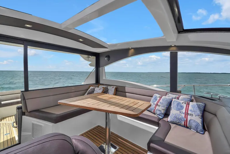  Yacht Photos Pics Interior of 2017 Galeon 445 HTS yacht with ocean view and seating area.