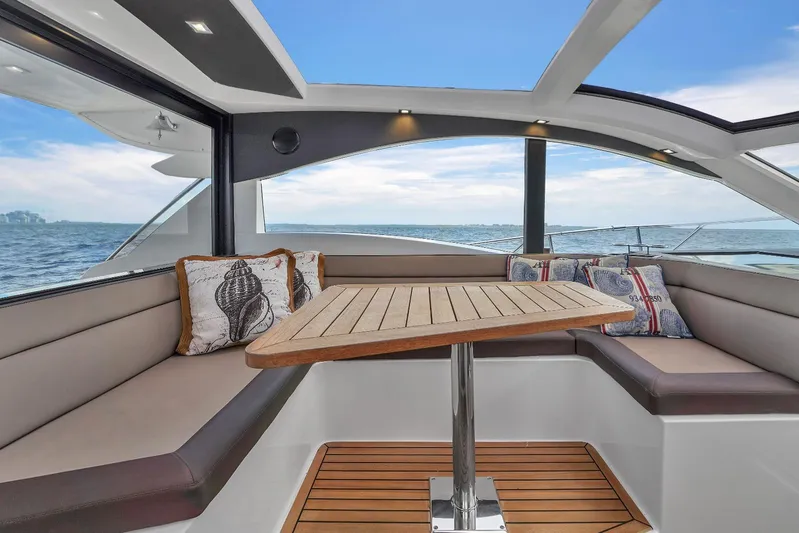  Yacht Photos Pics Interior of 2017 Galeon 445 HTS yacht with ocean view and cozy seating area.