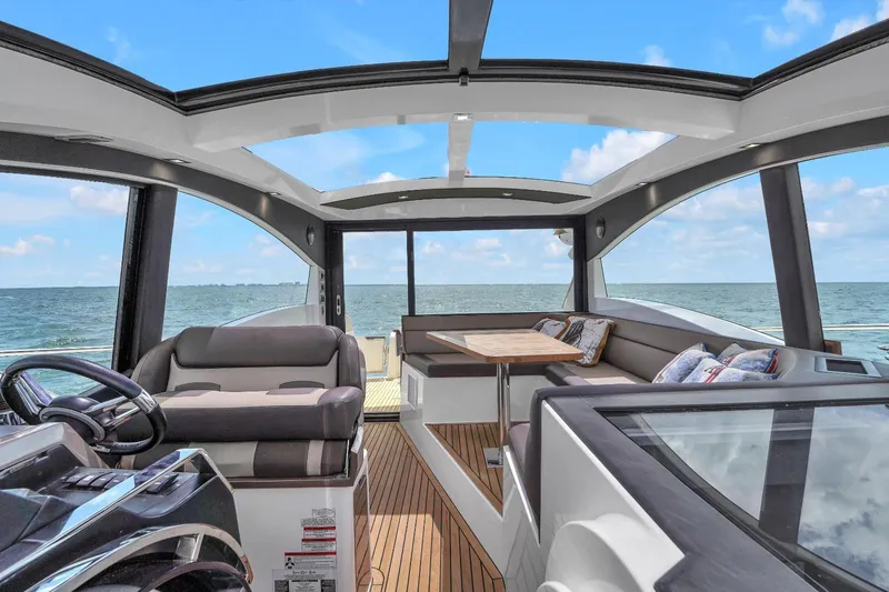  Yacht Photos Pics Interior of 2017 Galeon 445 HTS yacht with ocean view and modern seating.