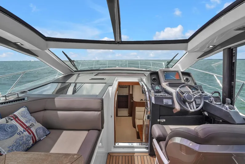  Yacht Photos Pics 2017 Galeon 445 HTS yacht interior with helm and seating area.