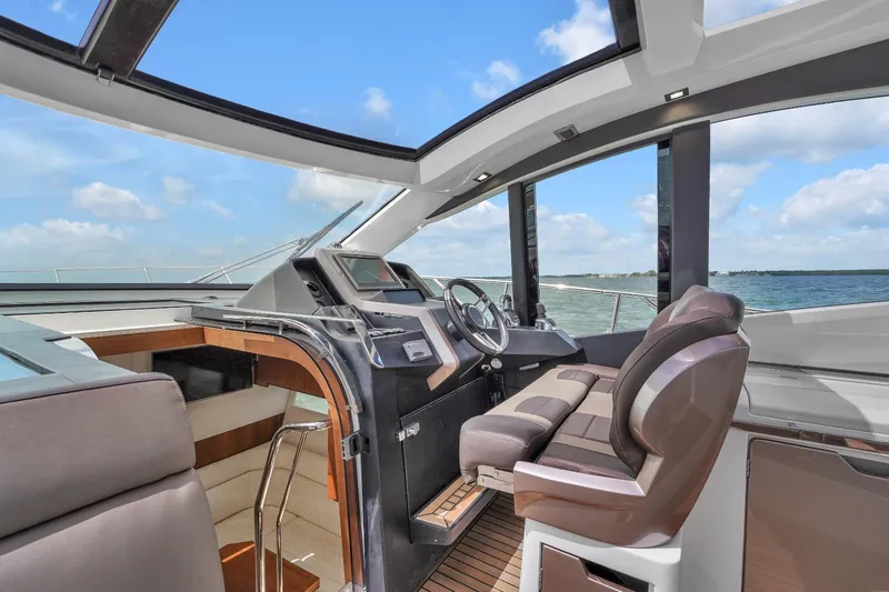  Yacht Photos Pics Interior cockpit of 2017 Galeon 445 HTS yacht with panoramic windows.