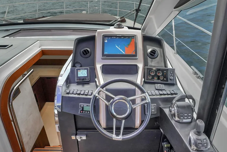  Yacht Photos Pics 2017 Galeon 445 HTS yacht helm with navigation screens and controls.