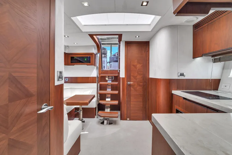  Yacht Photos Pics Interior of 2017 Galeon 445 HTS yacht with modern wood finishes and sleek design.