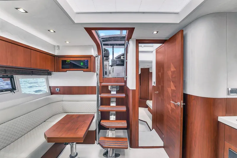  Yacht Photos Pics Interior of 2017 Galeon 445 HTS yacht with wooden finishes and modern design.
