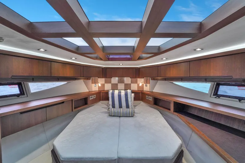  Yacht Photos Pics Luxurious 2017 Galeon 445 HTS yacht cabin with skylight and modern wood finish.