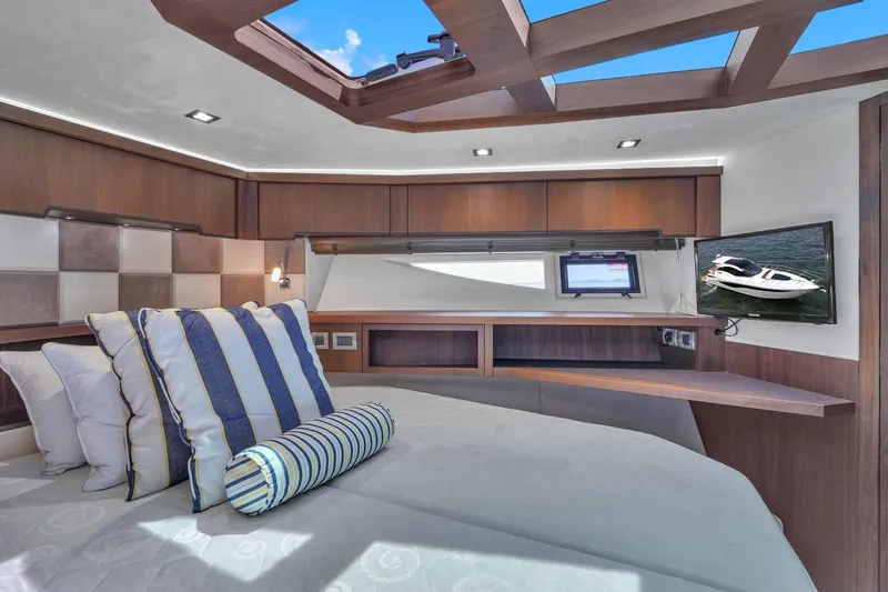  Yacht Photos Pics Luxurious bedroom interior of 2017 Galeon 445 HTS yacht with skylight and modern decor.