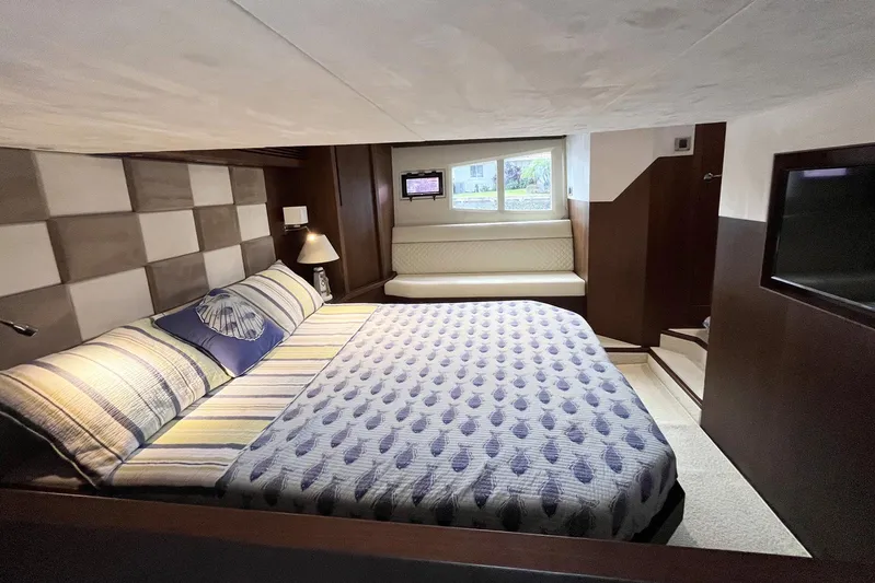  Yacht Photos Pics Luxurious bedroom interior of 2017 Galeon 445 HTS yacht with modern decor.